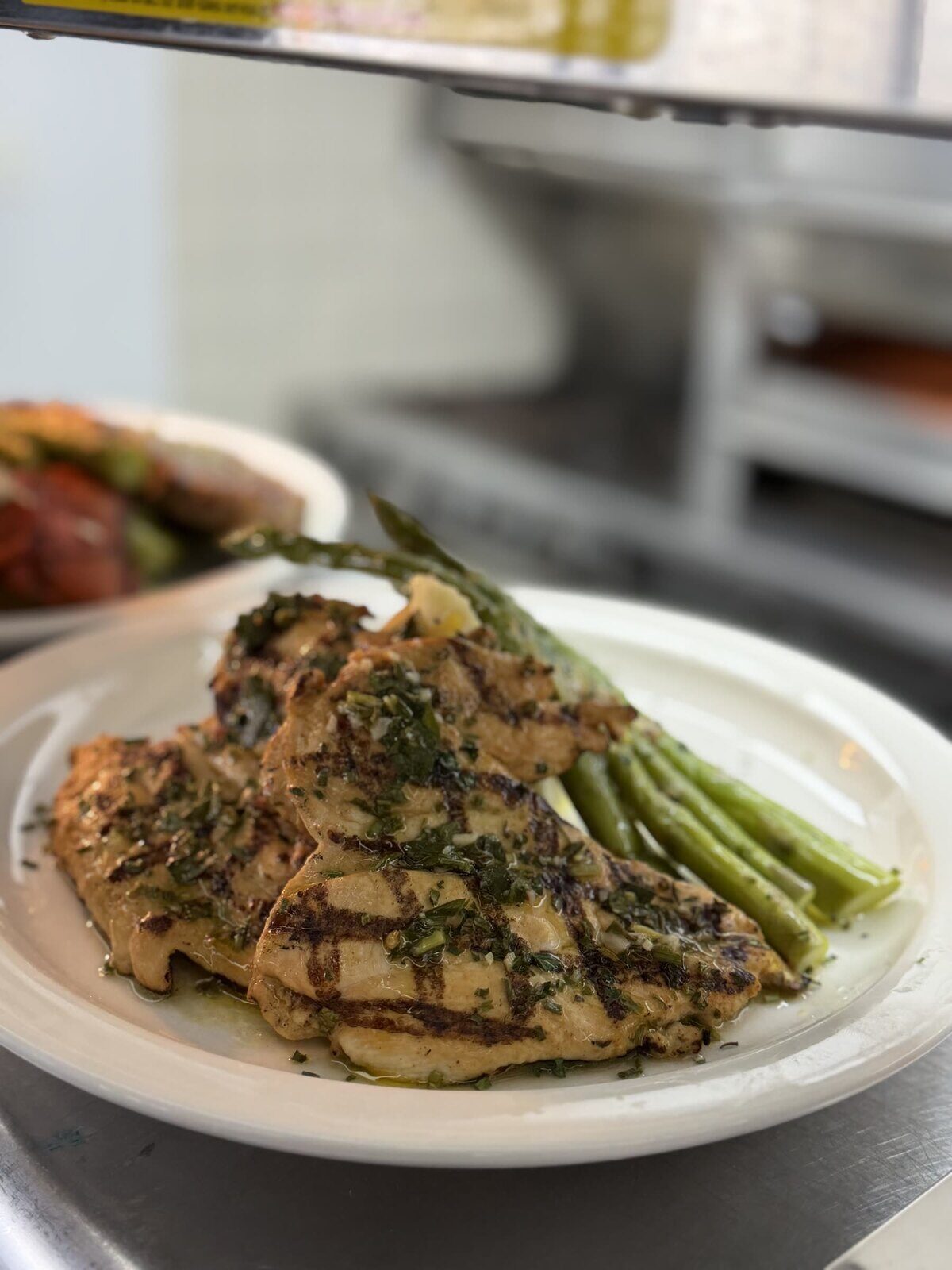 Grilled chicken with chimichurri and asparagus
